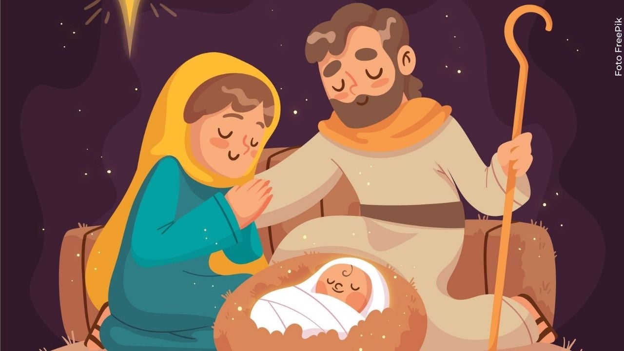 Familia en el pesebre con niño Jesús